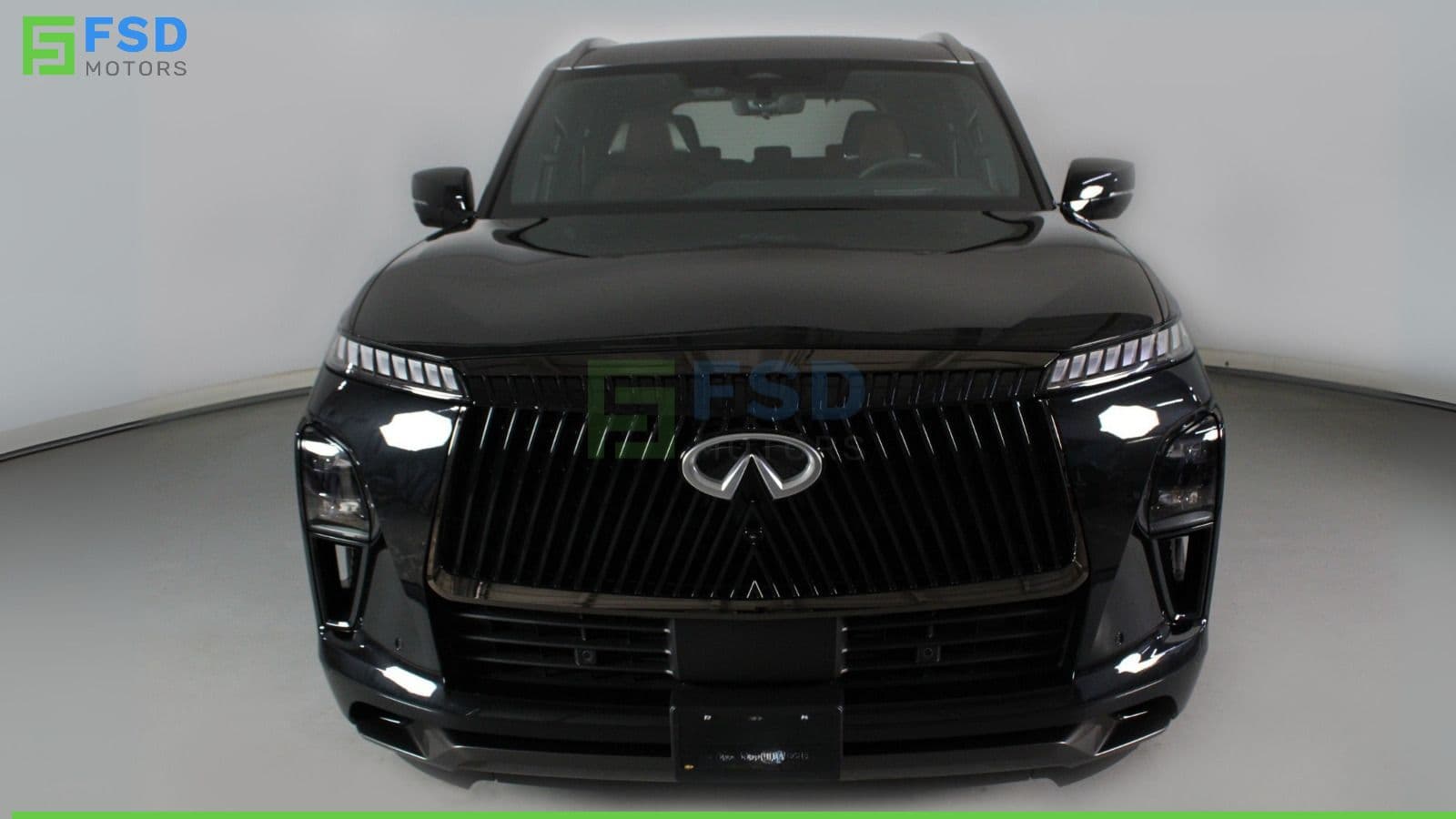2025 INFINITI QX80 luxury SUV with twin-turbo V6 engine, bold grille design, premium interior, and spacious seven-seat comfort designed for refined family and executive travel.